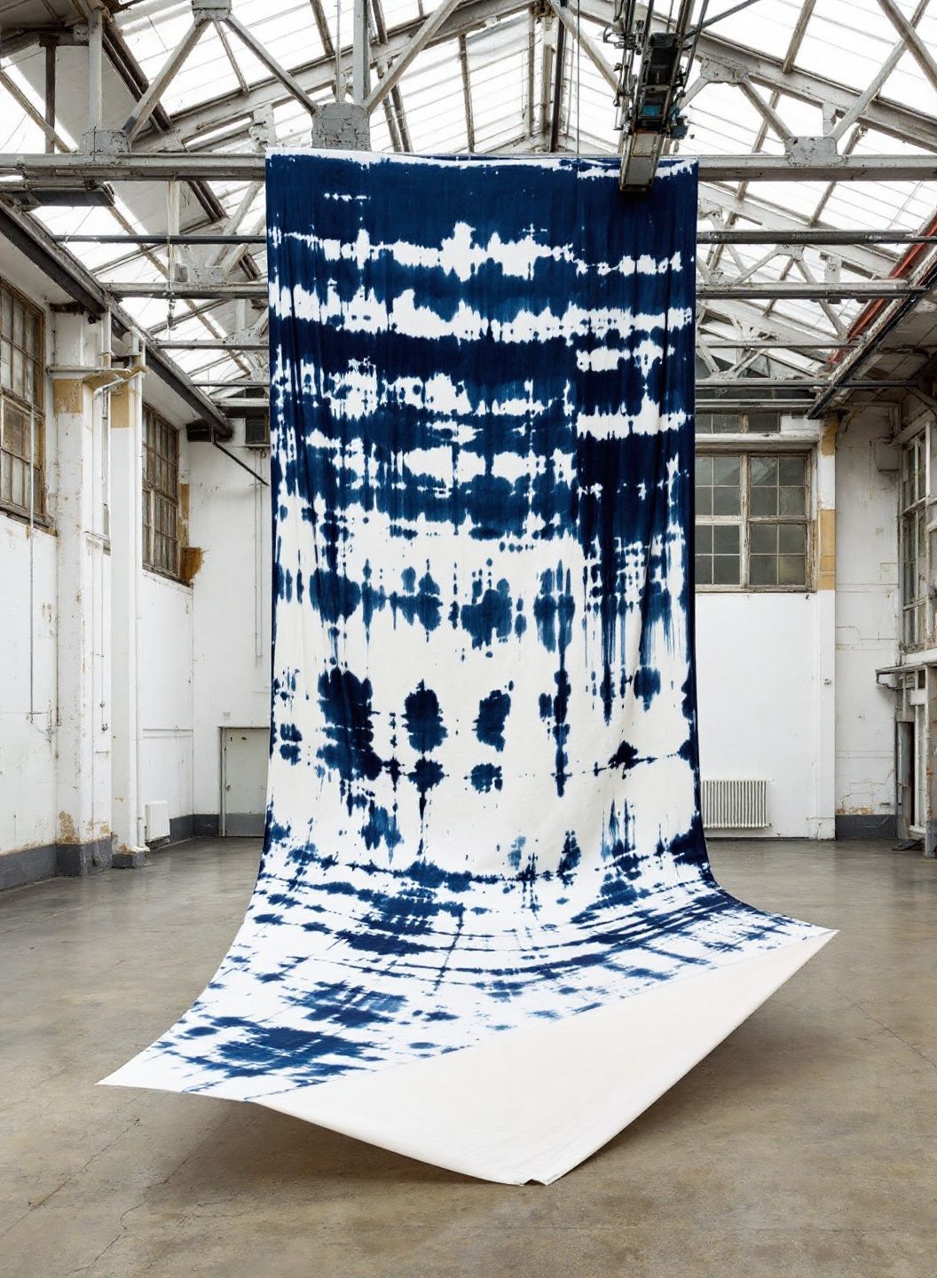 Nour Bahri, The Fold Remembers, 2026, indigo on hemp, 1100 x 340 cm, installation view